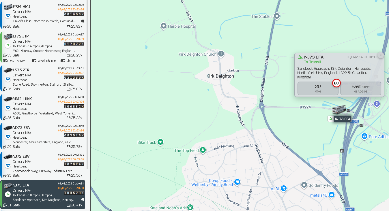 Live fleet map with a vehicle list on the left showing driver names, registration and status
